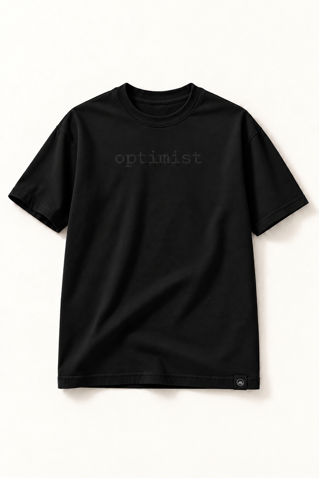 Black heavyweight T-shirt with a very subtle tonal optimist print, hidden sleeve message and woven hem label.